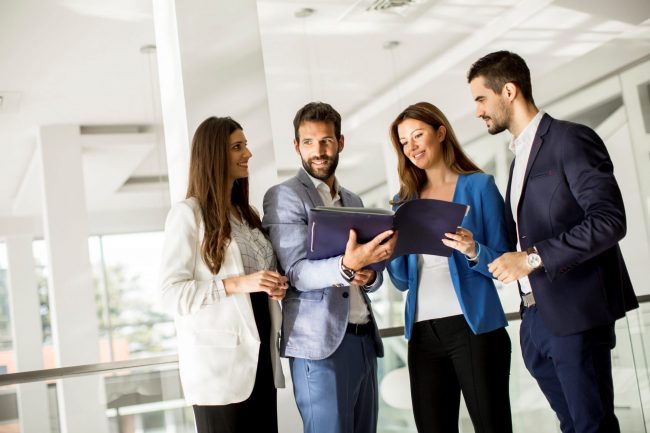 Group of entrepreneurs illustrates blog "Product Liability Insurance: What It Is and Who Needs It?"