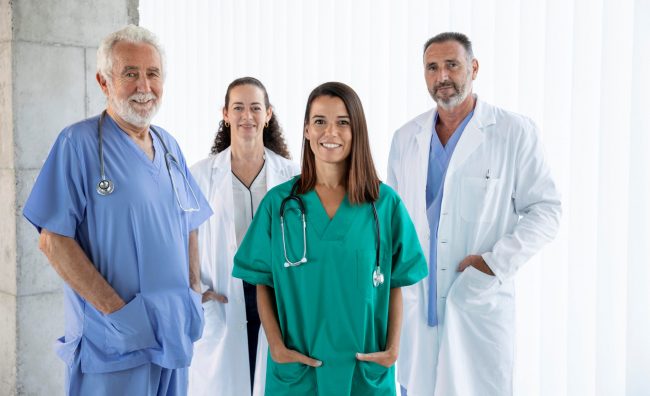 Photo of male and female doctors illustrate blog "Medical Malpractice Insurance: What You Need To Knowv"