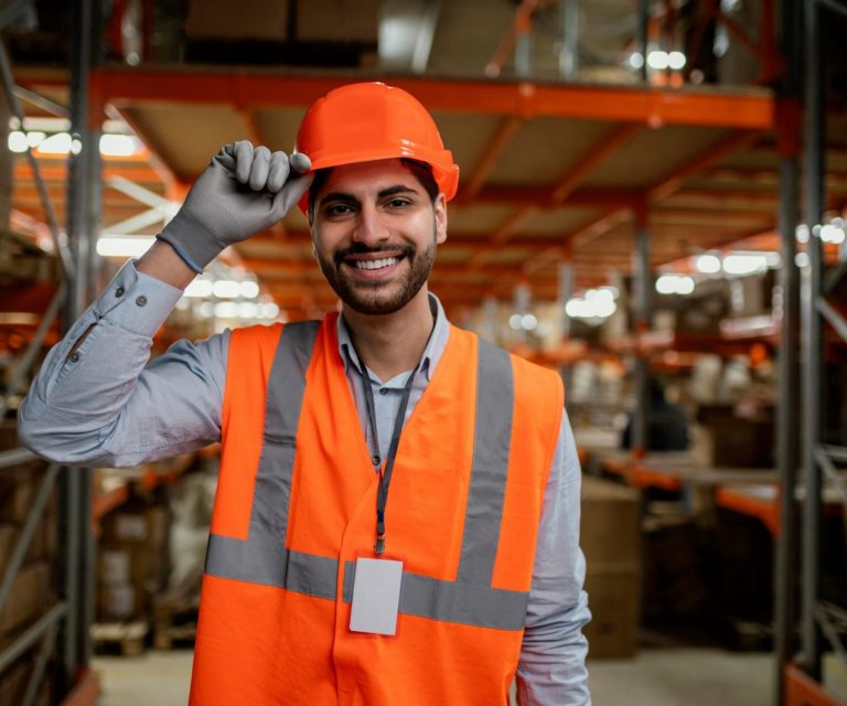 Man with hardhat and safety vest illustrates blog "Understanding Workers Compensation Insurance"