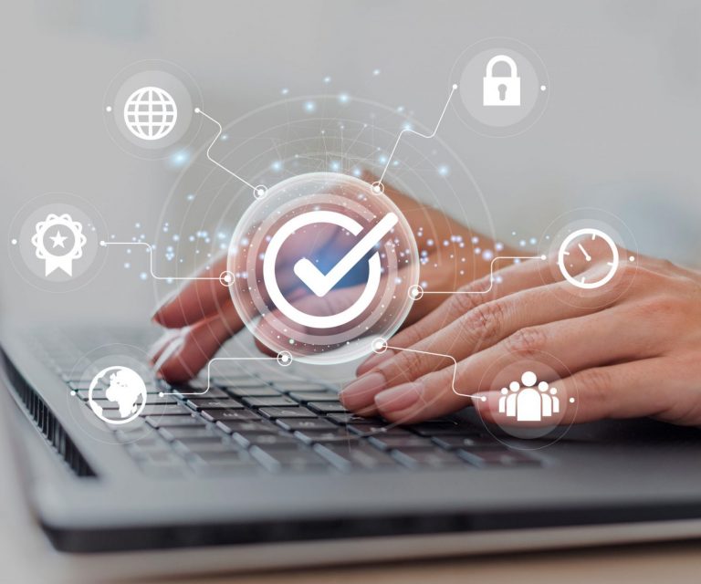 Closeup of person typing illustrates blog "Is Cyber Liability the Same as Professional Liability?"